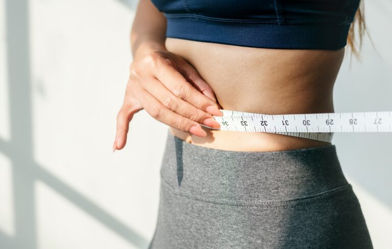 Patient monitoring sustainable fat loss progress through a medically supervised tirzepatide weight loss program.